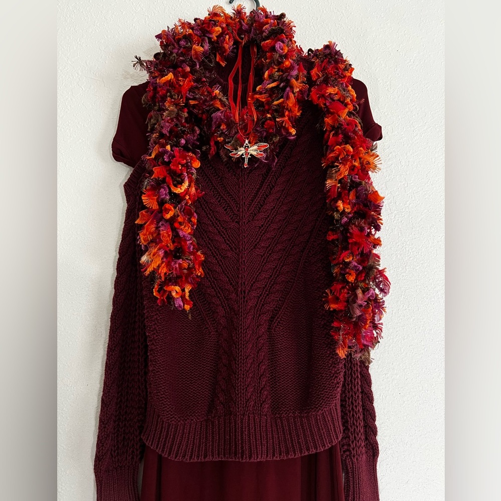 I am selling a dress with a soft sweater comes with a beautiful tight scarf